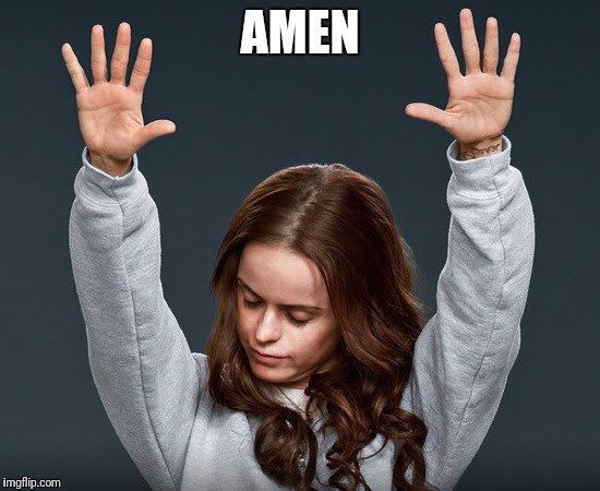 This meme features a photo of a woman with her hands raised in a prayer-like gesture, often referred to as "worship hands." The text "AMEN" appears above her head, implying that she is expressing gratitude or approval for something. The image is likely used to express agreement or enthusiasm for a particular statement or situation.